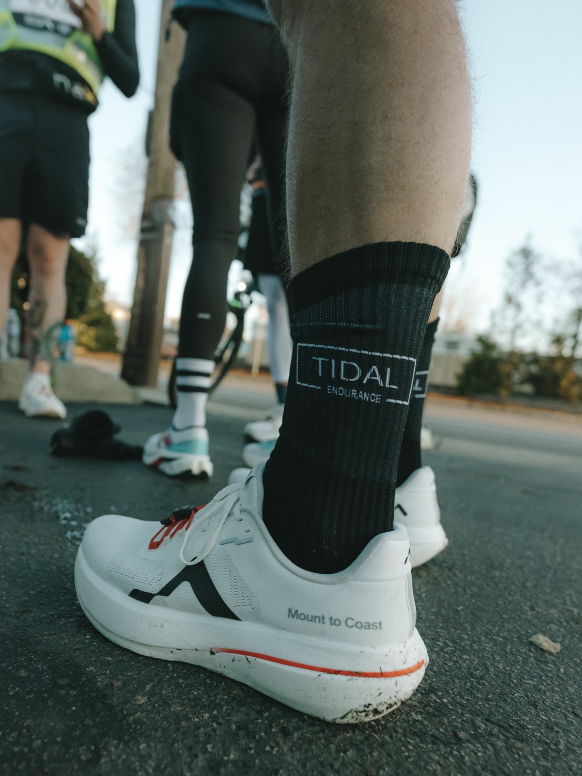 Tidal Endurance branded socks at the start line